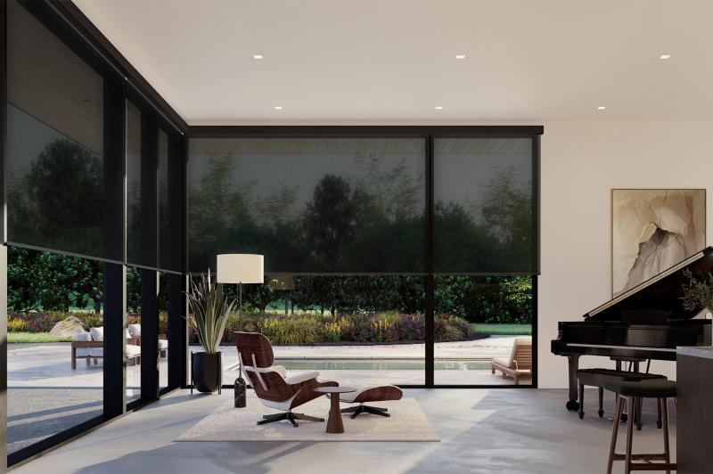 Lutron roller shades in a refined contemporary living room